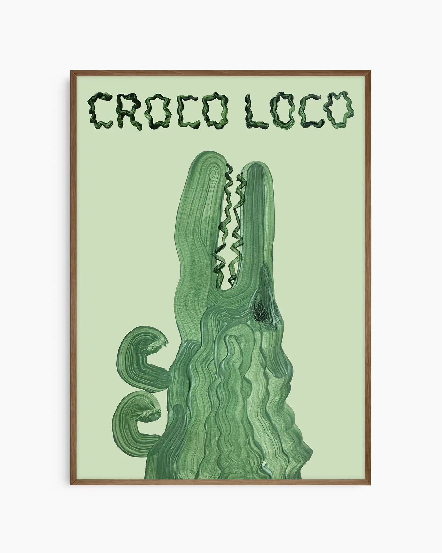 Green crocodile illustration with 'CROCO LOCO' text on a light green background in a dark oak frame.