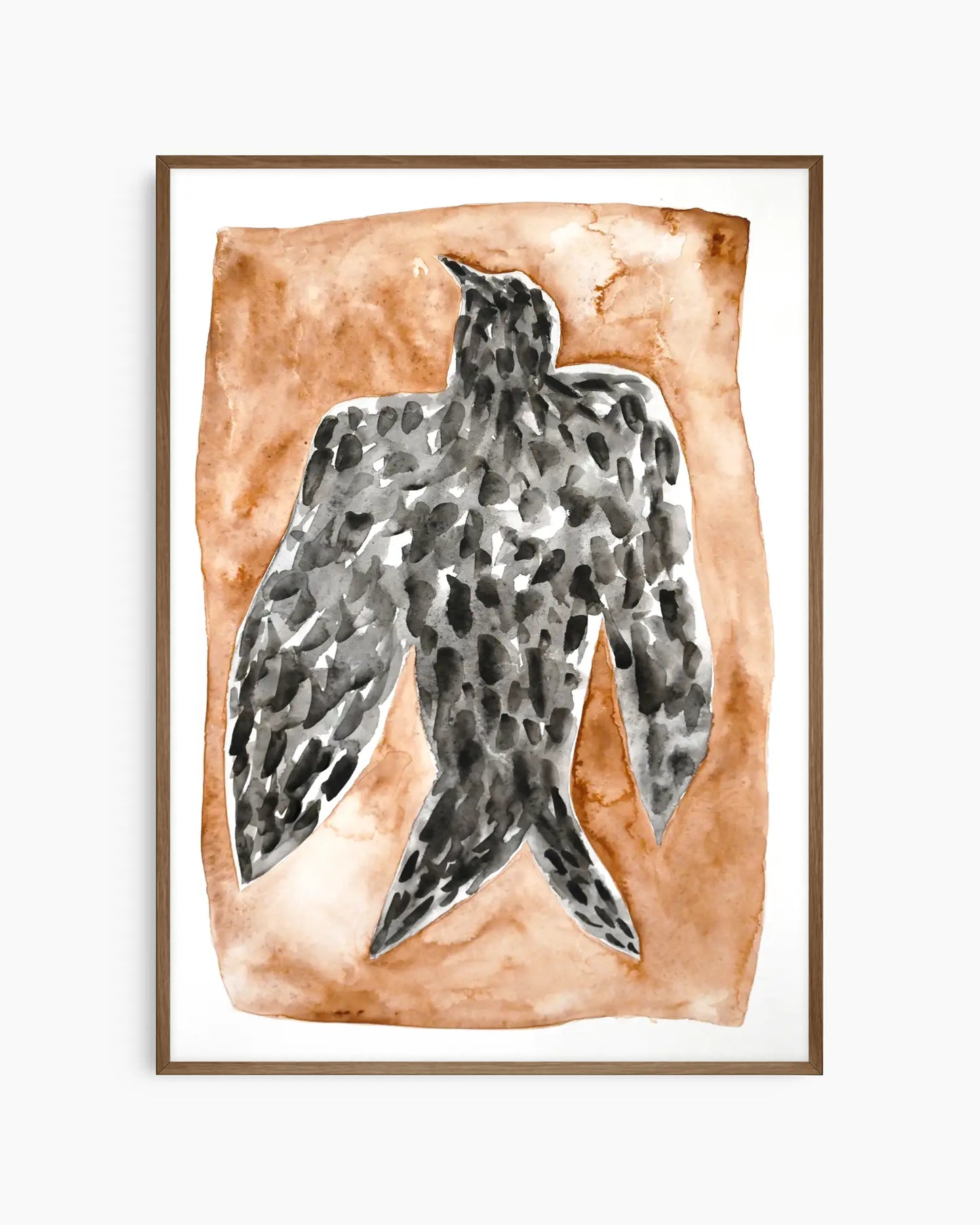 Artwork for the nursery of a black falcon on a brown background framed in a dark oak frame.