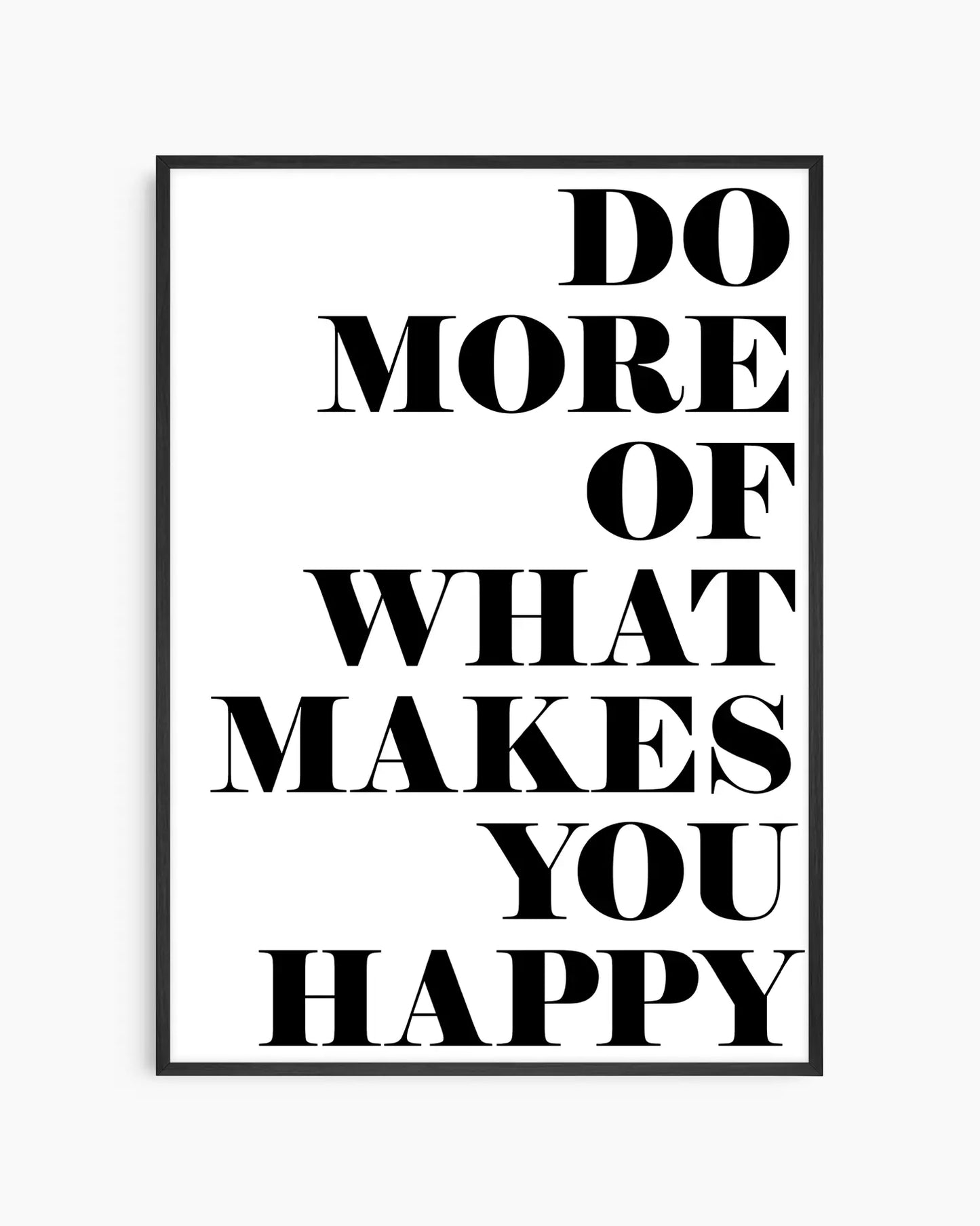 Motivational nursery poster with the text 'Do more of what makes you happy' written on a white background framed in a black wooden frame
