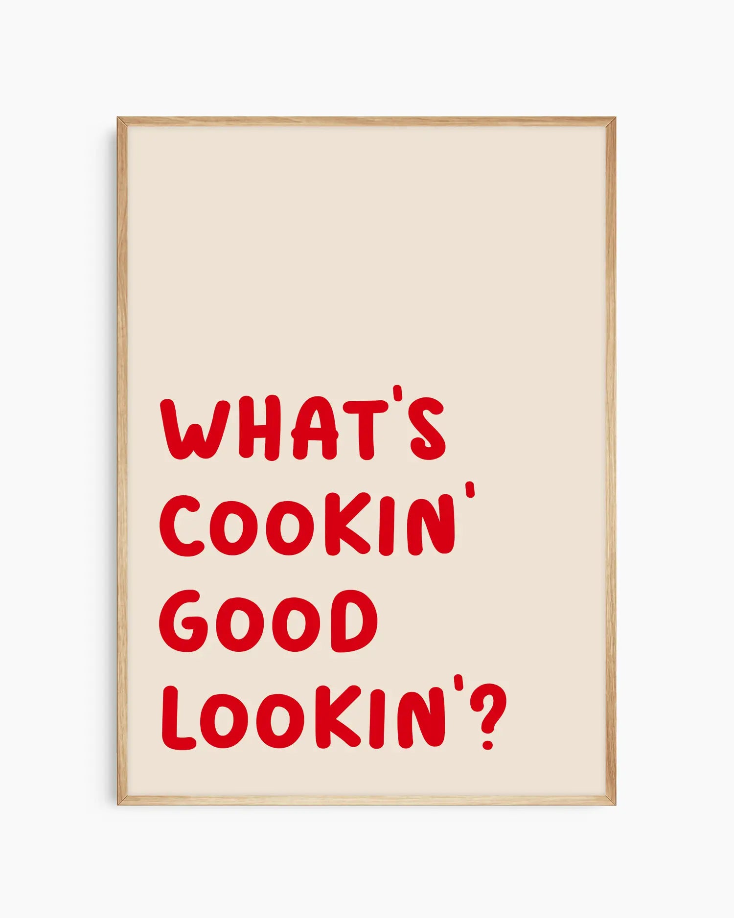 Nursery poster with red text saying 'What's cooking' good looking'?' in an oak wooden frame.