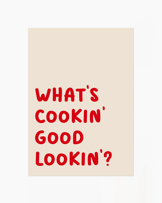 Nursery poster with red text saying 'What's cooking' good looking'?' on a beige background.
