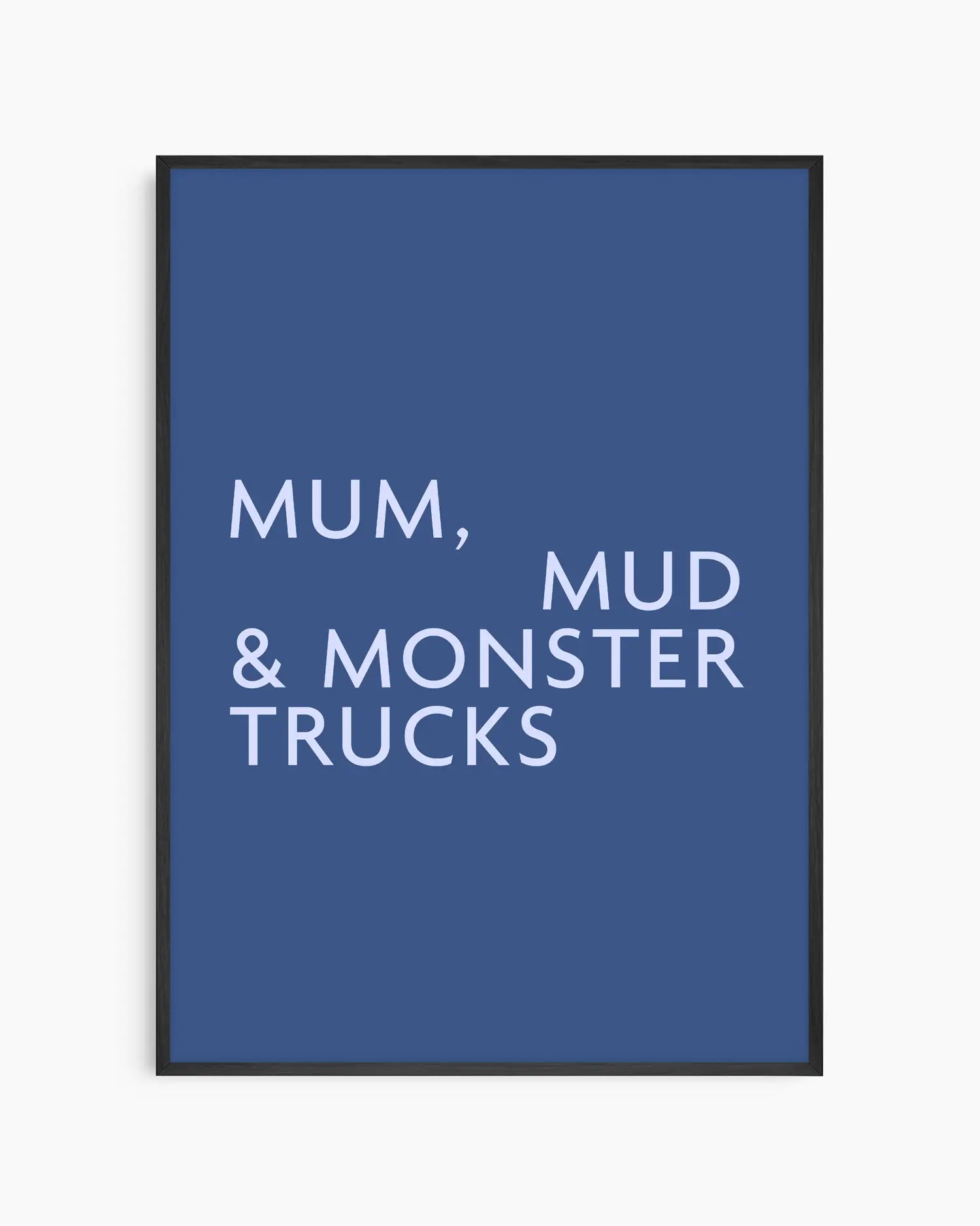 Poster with light blue text 'MUM, MUD & MONSTER TRUCKS' on a dark blue background in a black wooden frame.