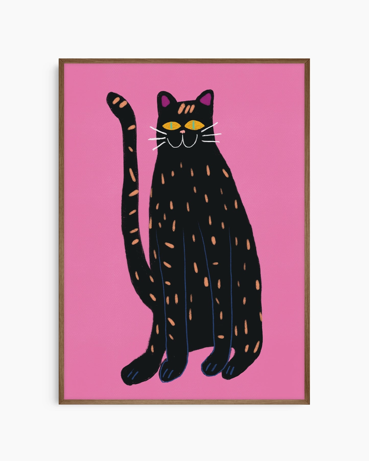 Framed artwork of a black cat with orange spots on a pink background