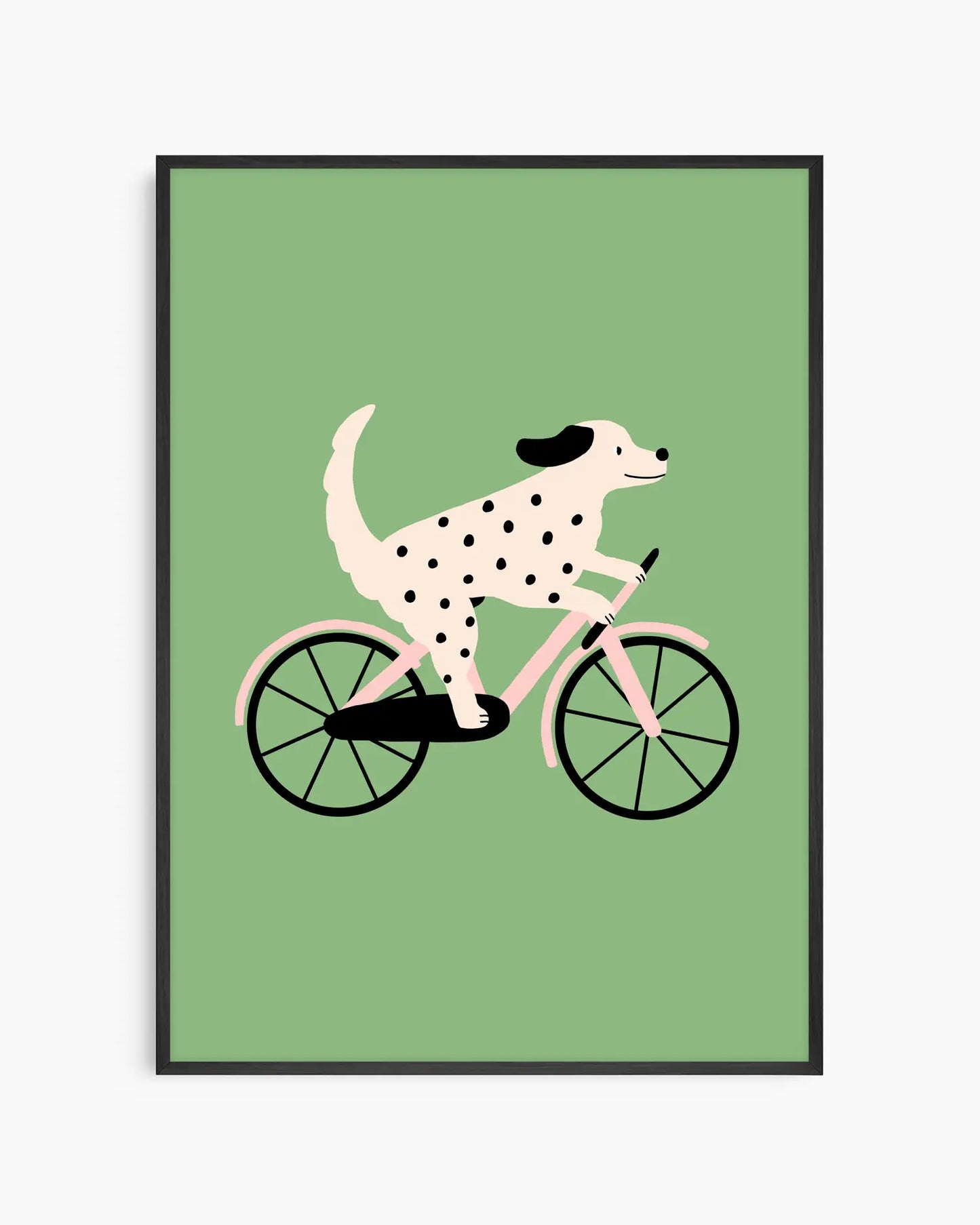 Framed artwork of a dalmatian dog riding a bicycle on a green background