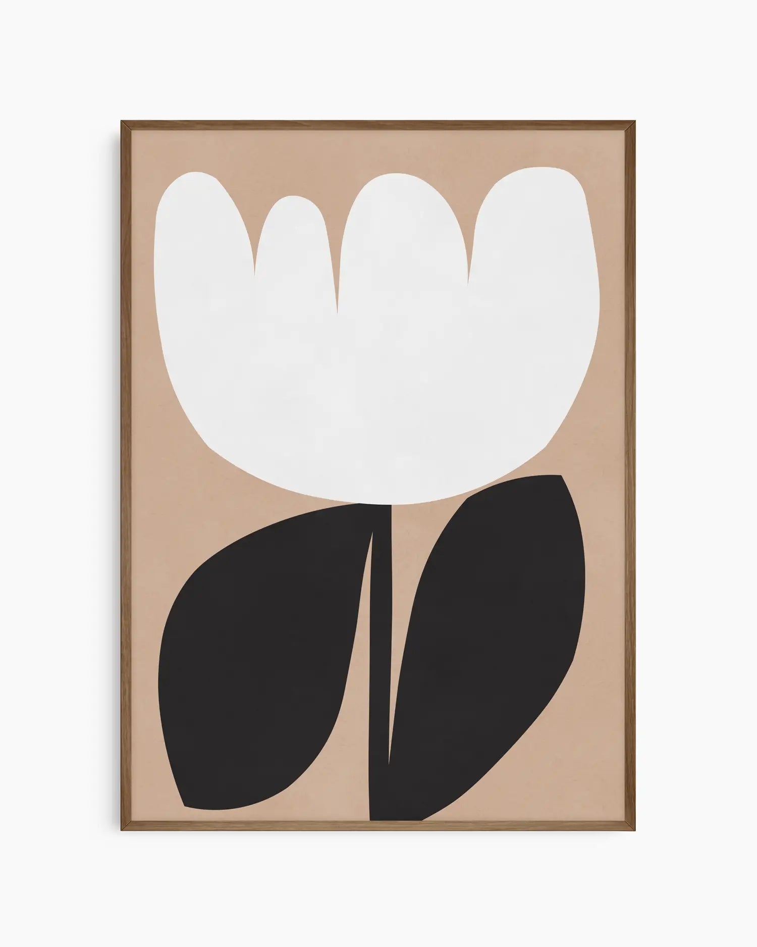 Framed artwork of a white tulip with black leaves on a beige background