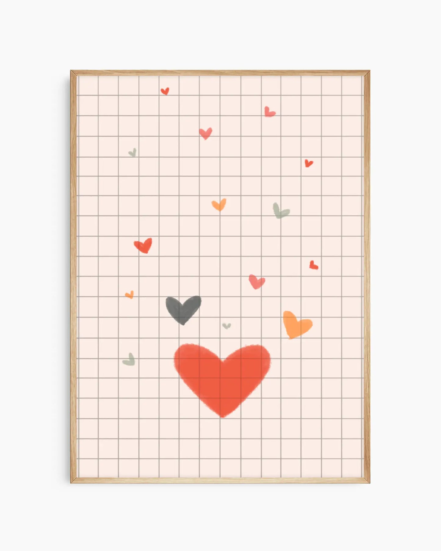 Framed artwork with colorful hearts on a grid background