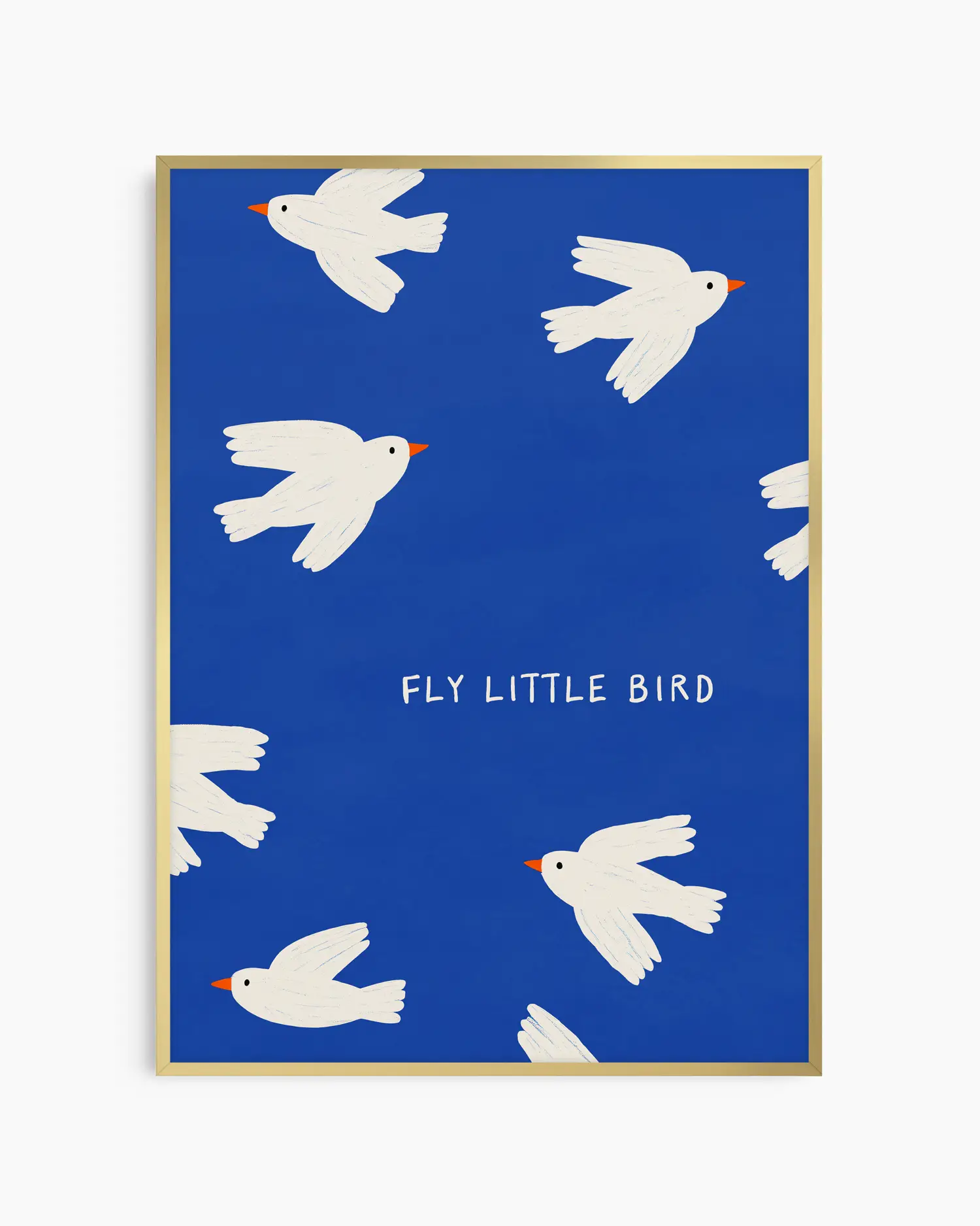 Framed artwork with white birds on a blue background and 'Fly Little Bird' text.