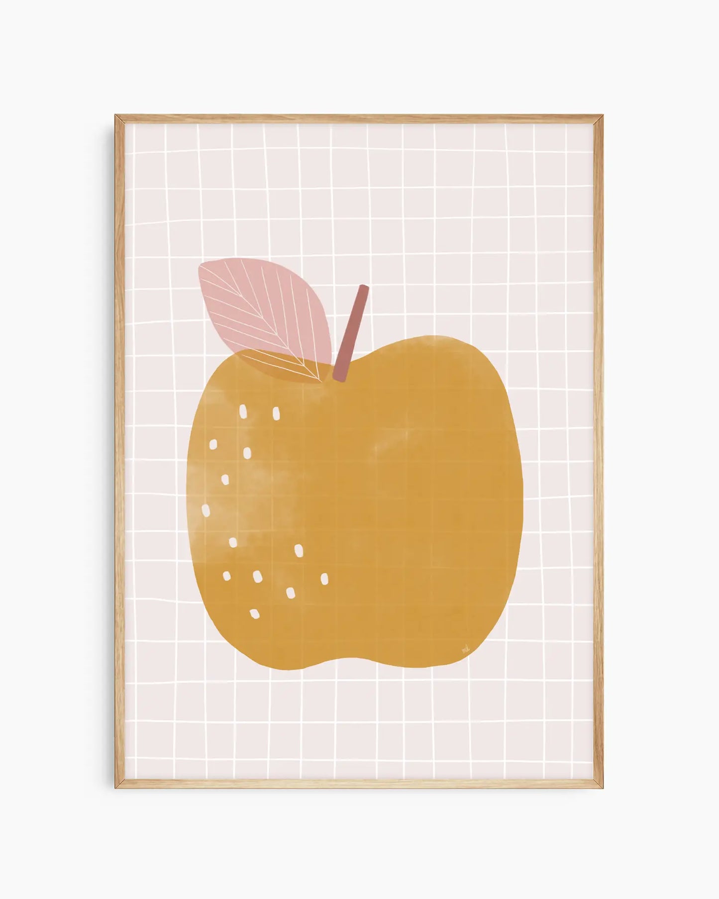 Framed artwork of a yellow apple with a pink leaf on a white background