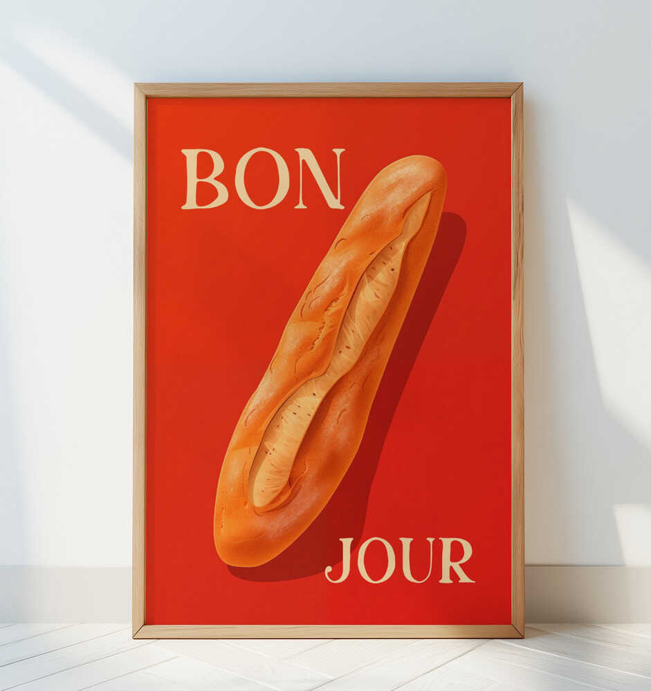 Framed poster with a baguette on a red background and the text 'BONJOUR' leaning against a white wall.