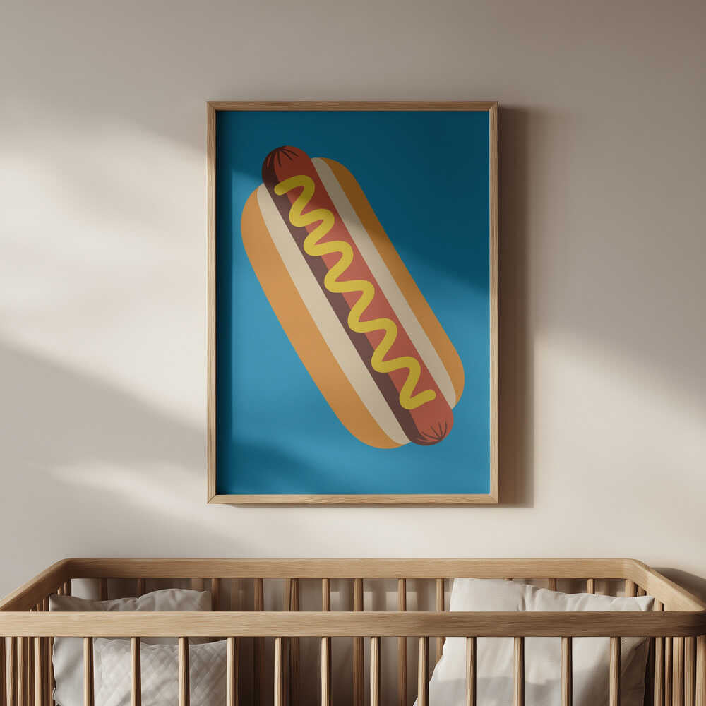 Framed children's poster of a hot dog on a blue background above the baby crib