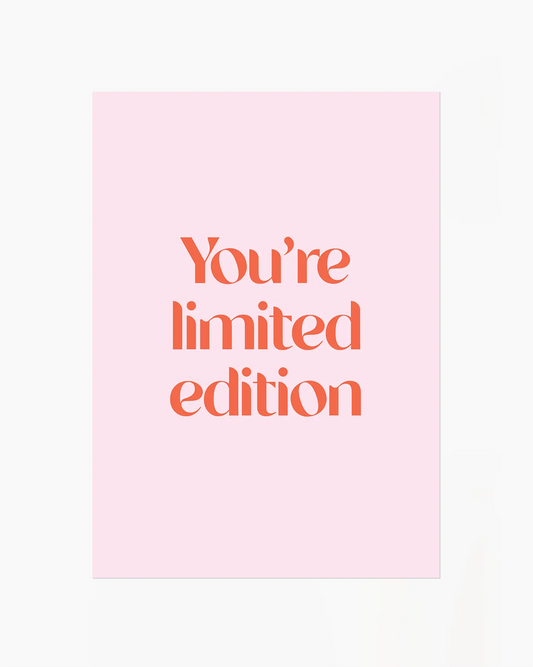 Children's poster with red text 'You're limited edition' on a pink background 