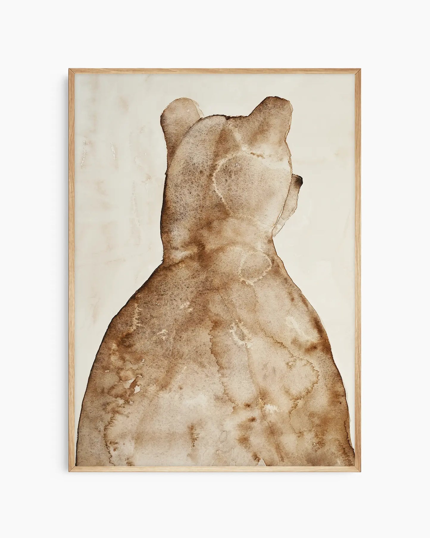 Children's illustration of a brown bear on a beige background framed in an oak frame
