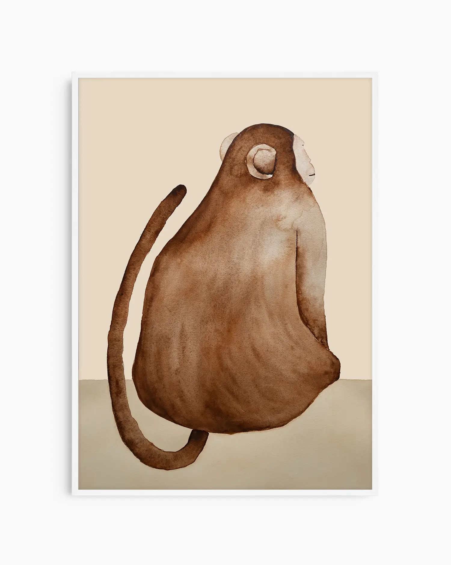 Nursery poster of a brown monkey on a beige background inside of a white wooden frame.