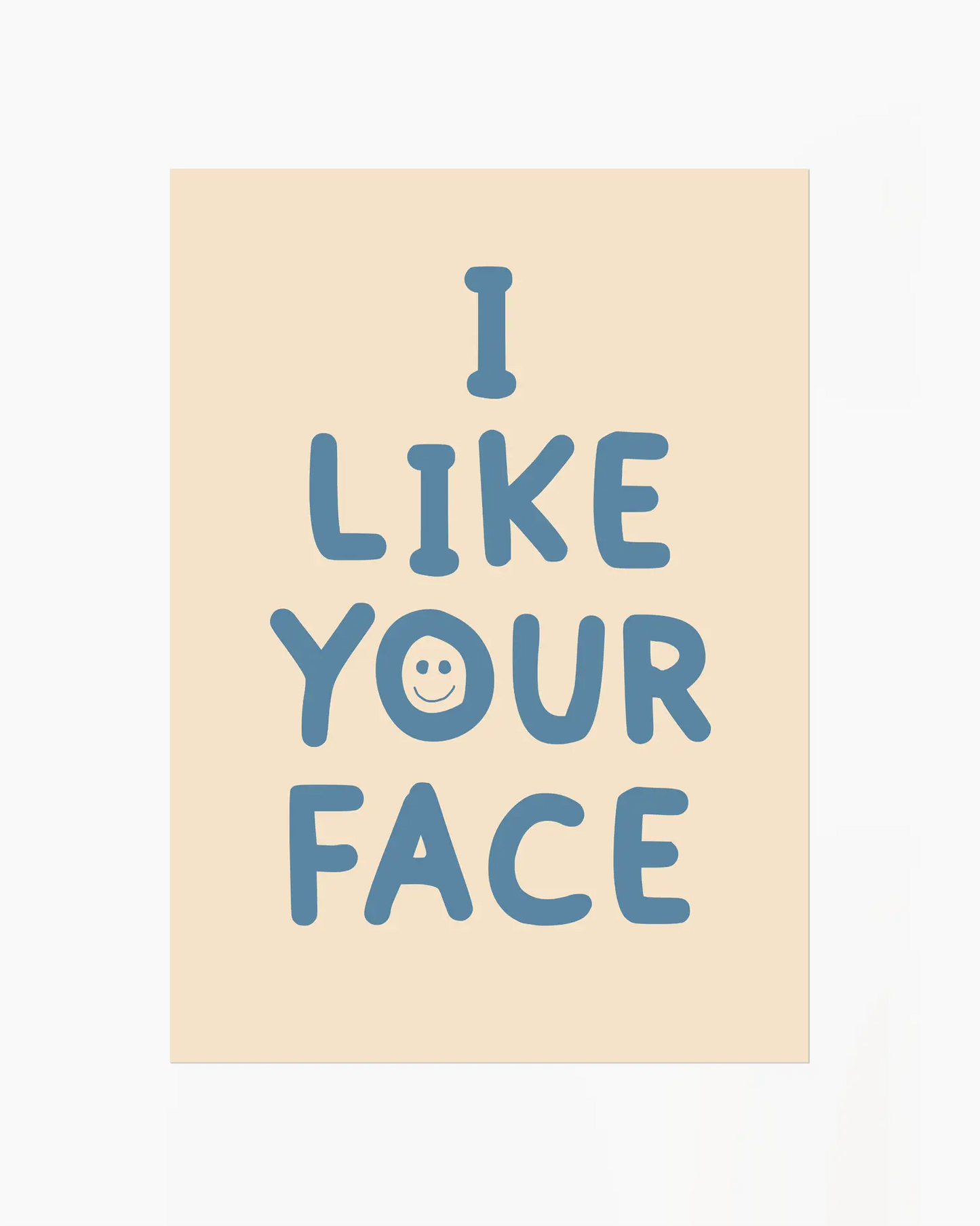 Beige nursery poster with the text 'I like your face' written in blue.