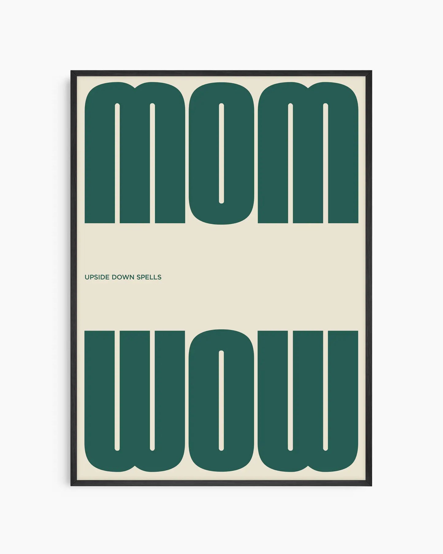 Poster with the green text 'MOM upside down spells WOW' in a minimalistic design on a beige background, framed in a black wooden frame. 