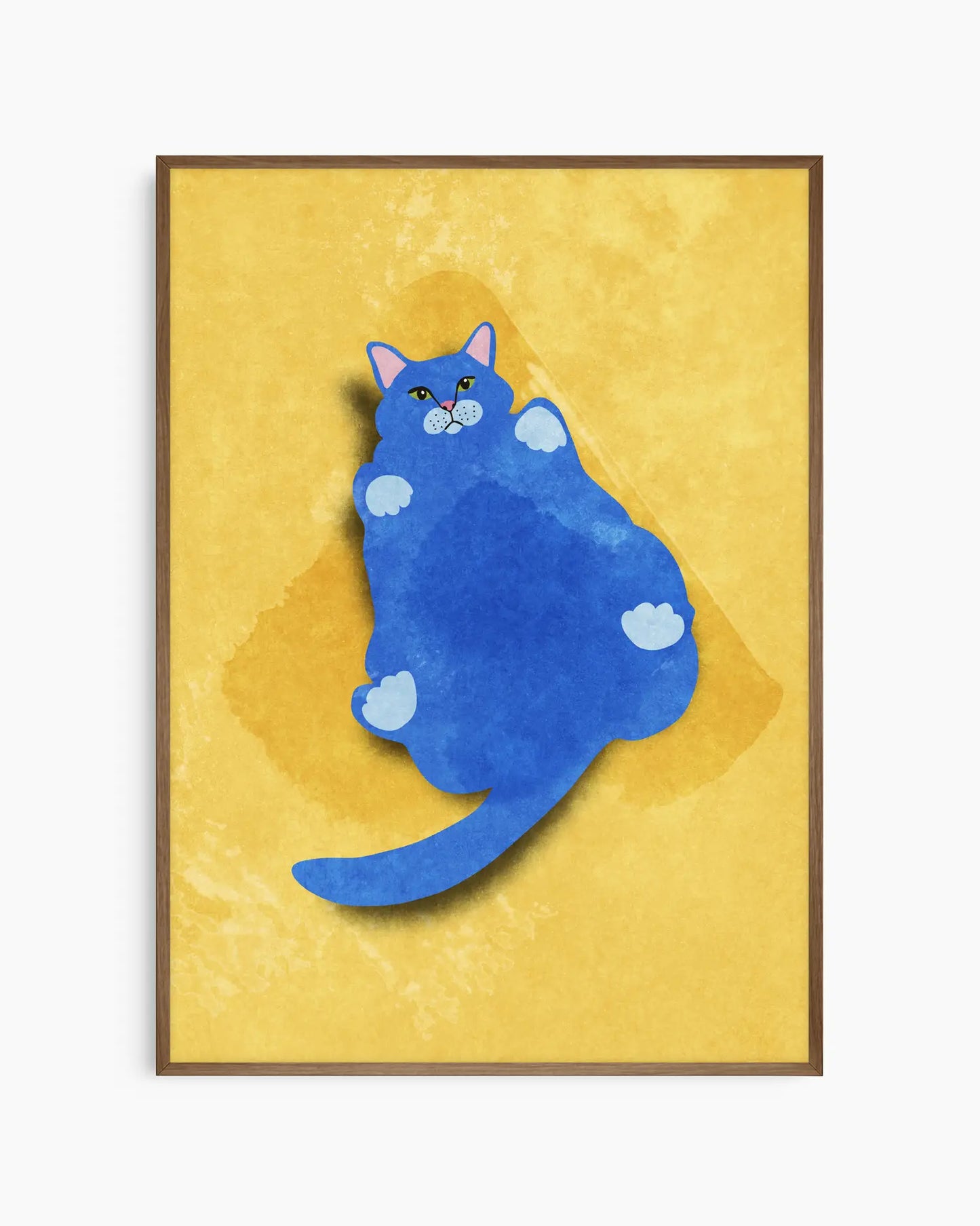 Framed artwork of a blue cat on a yellow background