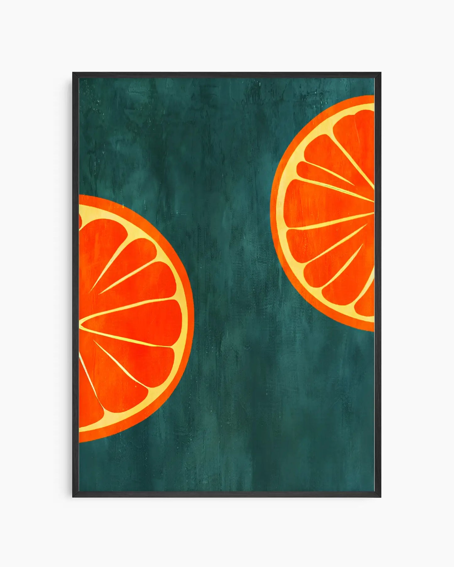 Framed artwork of two orange slices on a teal background