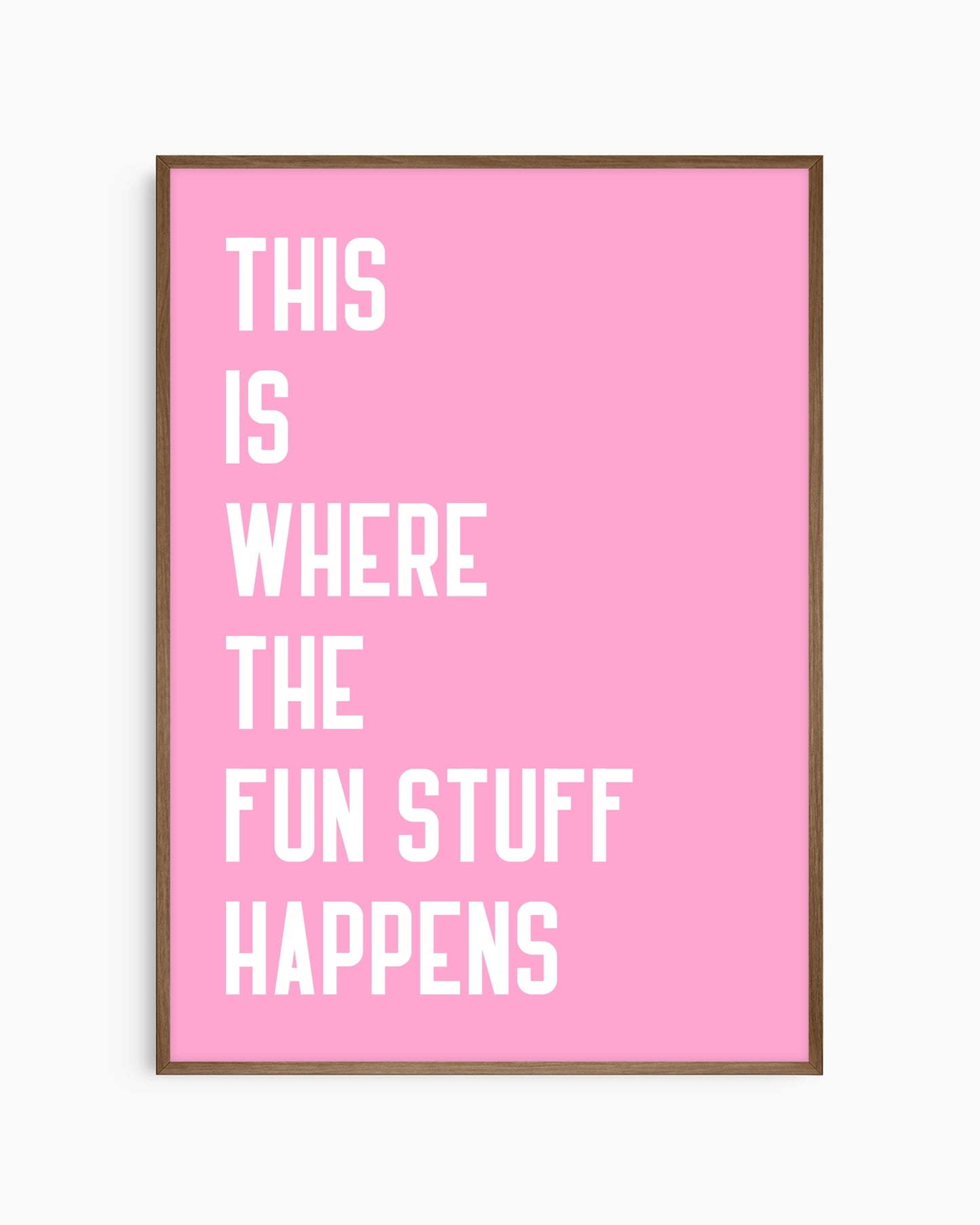 Framed poster with motivational quote on a pink background
