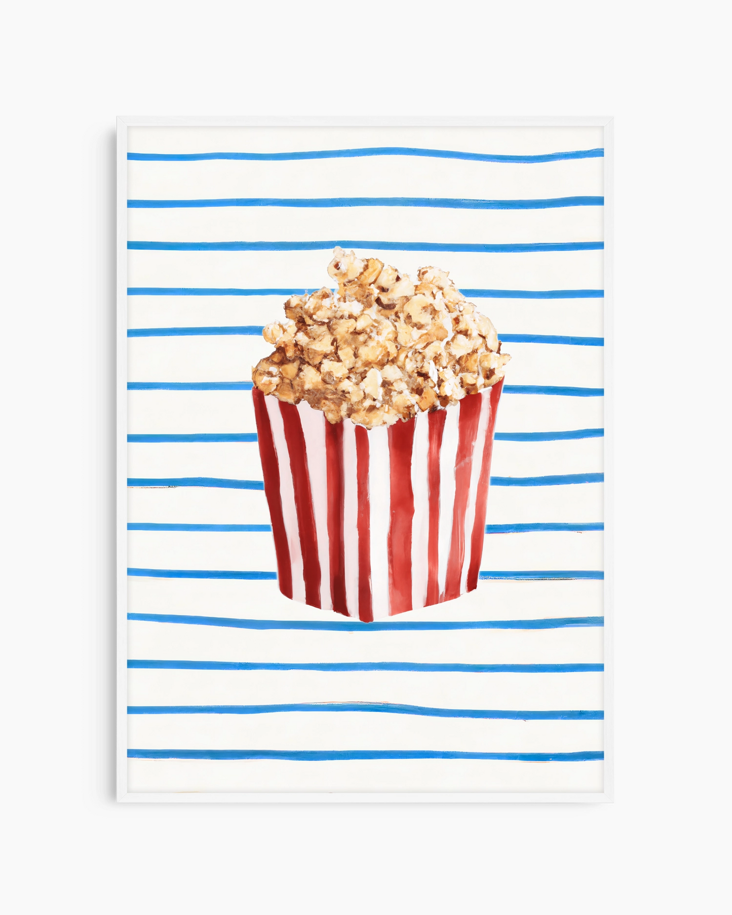 Popcorn in a red and white striped bucket on a white background with blue stripes
