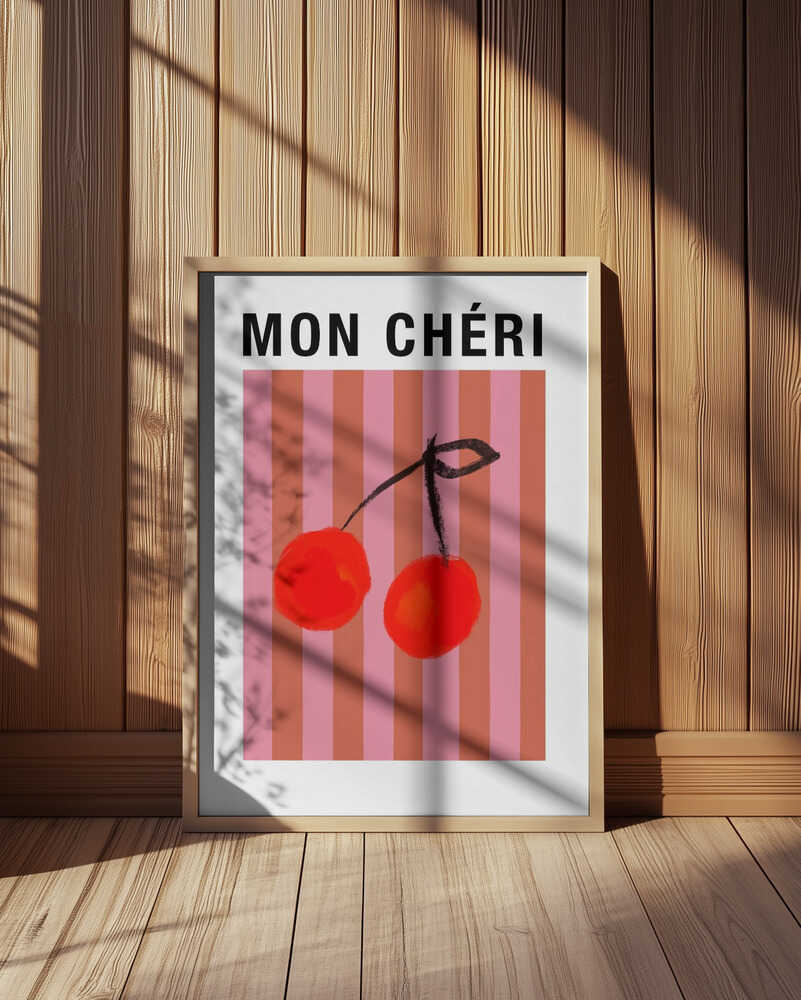 Nursery poster of two red cherries on a striped pink and orange background and the text 'MON CHÉRI' on top