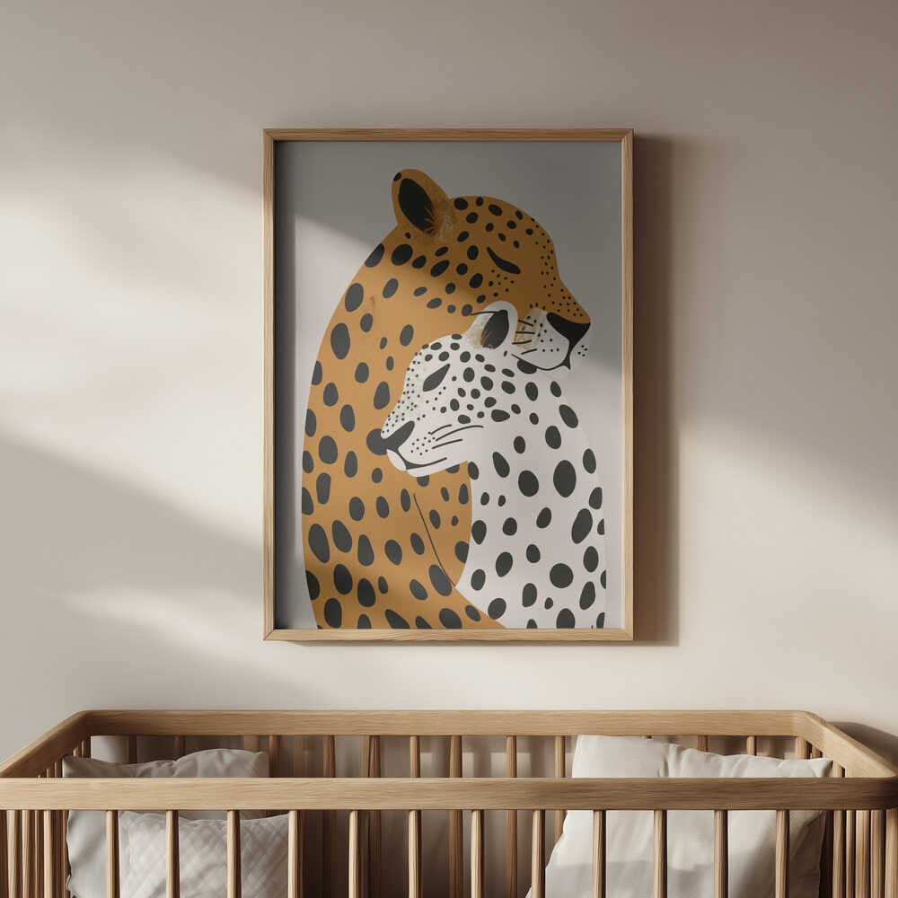 Nursery artwork of two leopards with different patterns hanging on the wall above the bed in the kids room.